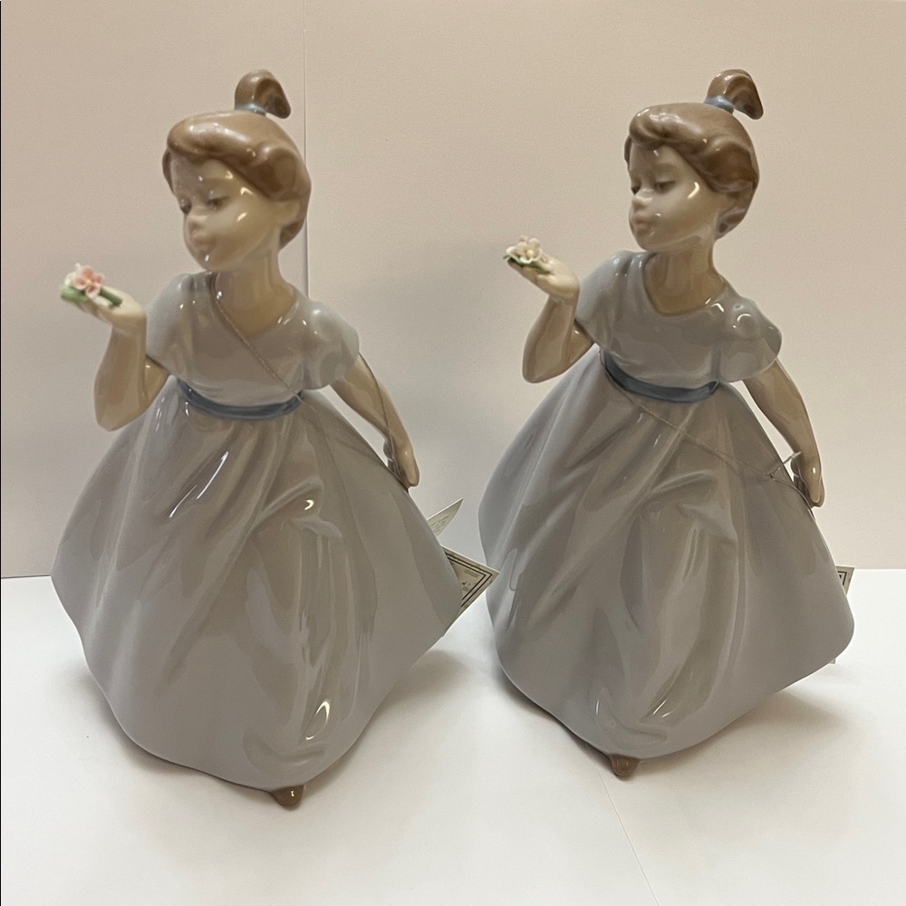 NADAL Porcelain Figurines. Two girls with flowers Over 25 years old.